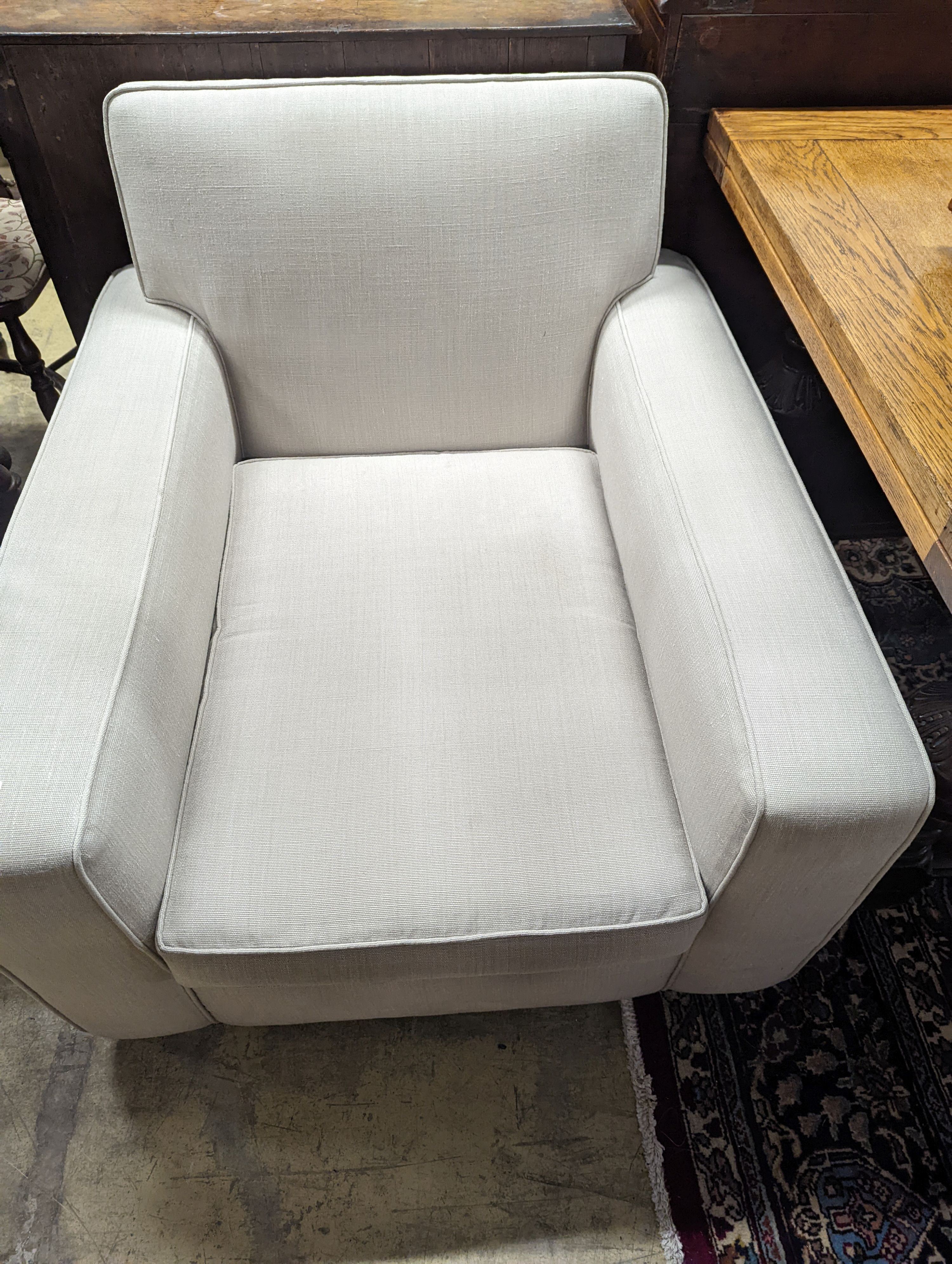 Kingcome furniture, Texas armchair in cream fabric, width 88cm, depth 98cm, height 82cm